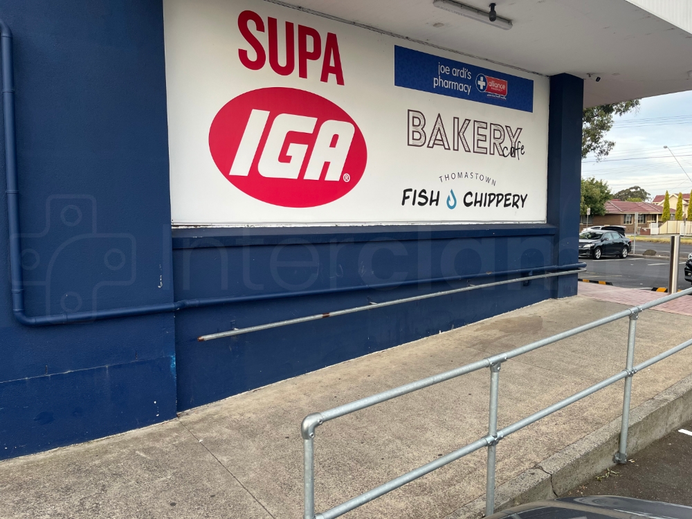 Interclamp galvanised tube clamp handrail fittings used to construct a guardrail at a retail park